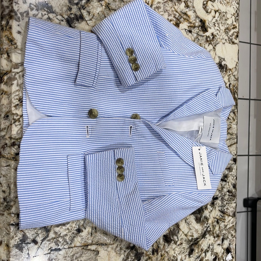 White and blue pinstripe suit from Jamie and Jack